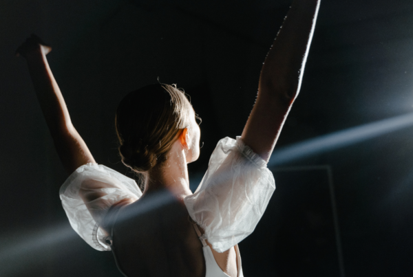 Dancer taking a bow to the crowd in a Press release announcing American Players Theatre and 501(c) Services partnerhsip