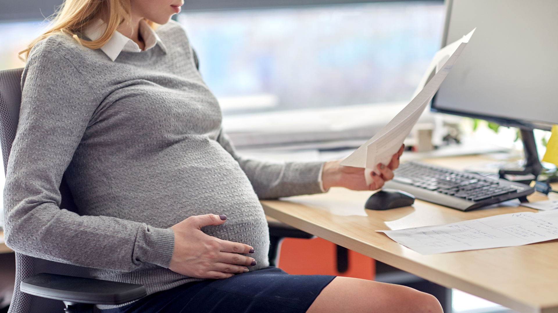 Pregnant employee in an article about pregnancy and harassment policy updates