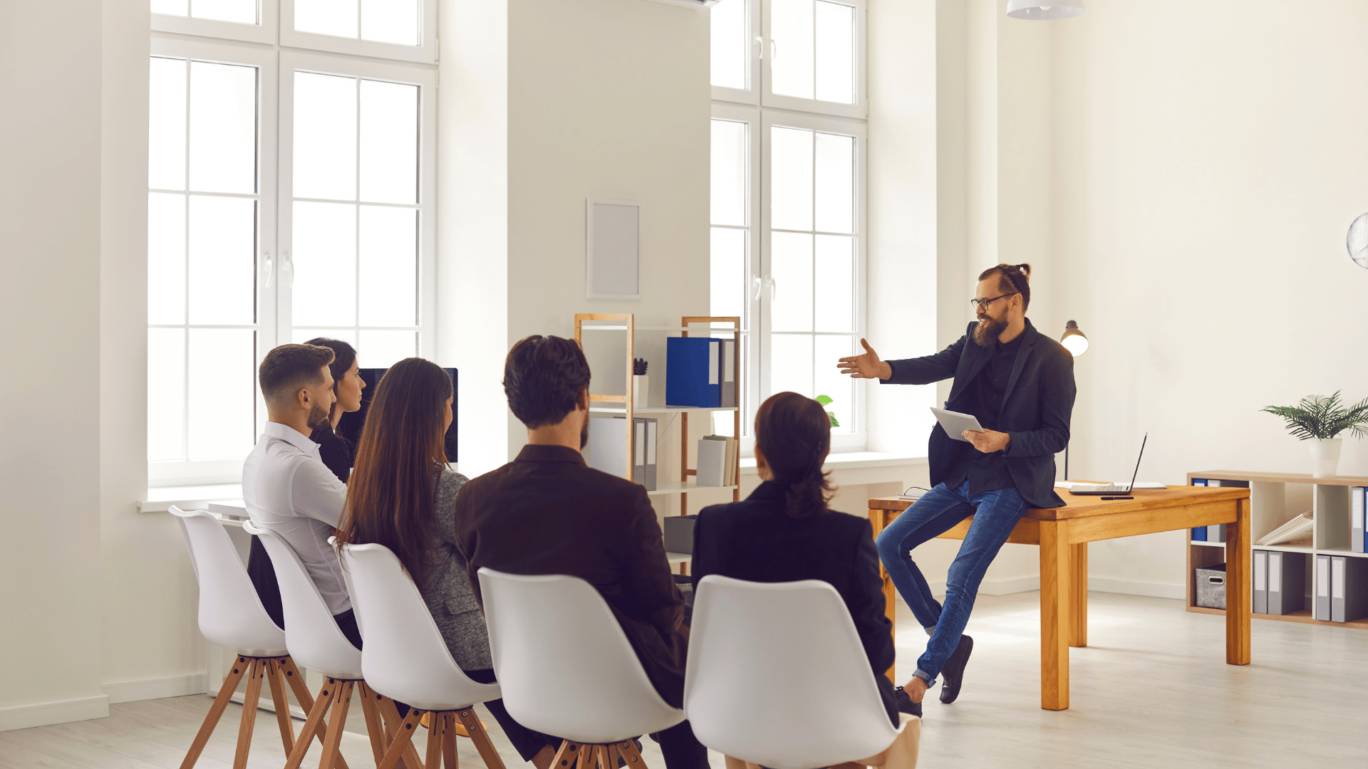 Staff meeting in an article about captive meetings for nonprofits